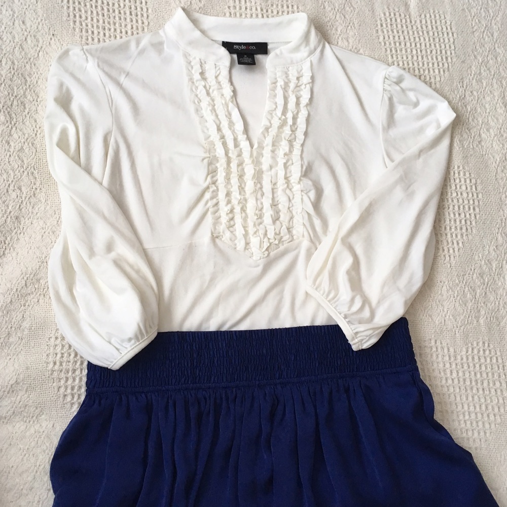 White ruffled blouse